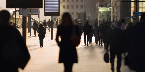 Businesswomen, businessmen and office workers in silhouette