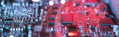 Close up shot of computer motherboard with computer chips. Digital processing unit with wires and cables for laptops and supercomputers.