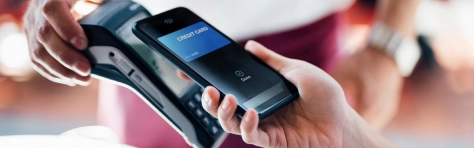 Close-up shot of a female hand using her smart phone to scan and pay for a bill at the restaurant during the day. Contactless payment, Technology Concept.Paying Banking Contactless Payment Credit Card Smart Phone Technology Portable Information Device Business Mobile Payment Electronic Banking Financial Bill Close-Up Credit Card Purchase Service Restaurant Digital Wallet Security Mobile App Shop Lifestyles Credit Card Reader People Tap To Pay Device Screen Buying Using Phone Small Business Wireless Technology