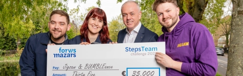 Steps Team Challege charity cheque presentation