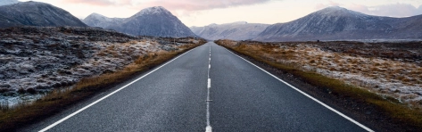 Small tour guide going though Scotland