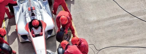 Group of people working on race car
