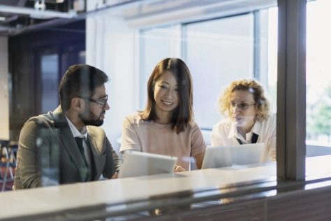 Group of people talking in the office