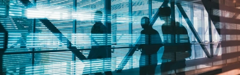 NEDs walking in high-tech hallway