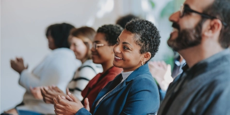 Group of people applauding