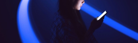 Woman reading a guide to Agentic AI