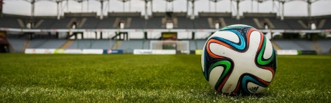 Soccer Ball on Grass Field during Daytime