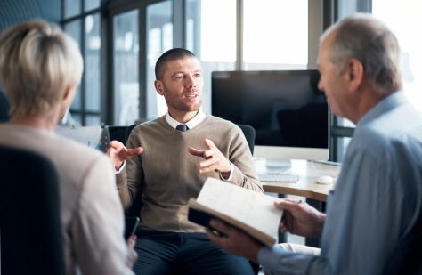 Person discussing the Considerations for UK employers from the EU Pay Transparency Directive