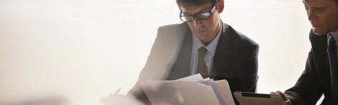 Image of businessmen working together