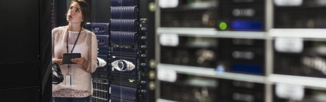 Caucasian technician using digital tablet in computer server room - Network Server, IT Support, network, telecommunications, server room, technology data Technology, Security, Leadership, Business, Control Room, Women, The Internet, Office, Computer, Technician, People, Connection, Real People, Computer Network, Only Women, Storage Room, Communication, Standing