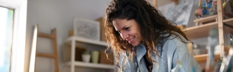 Woman smiling looking down