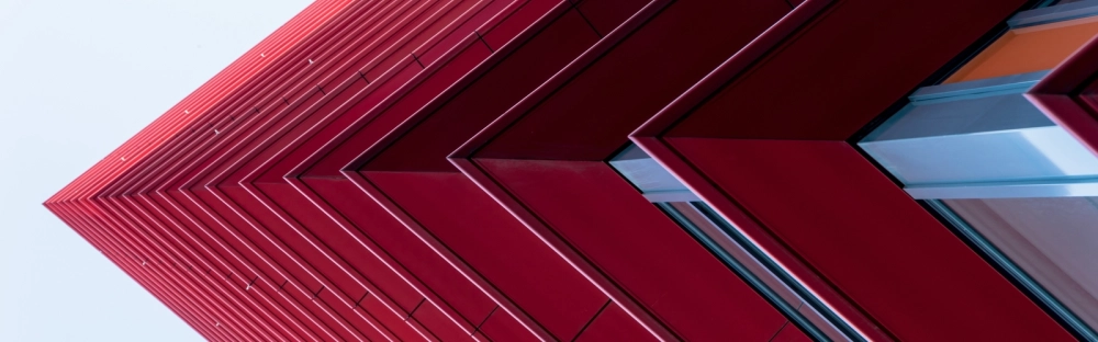 30c30efcc646-Red-corner-building-header-1600x500.jpg.webp