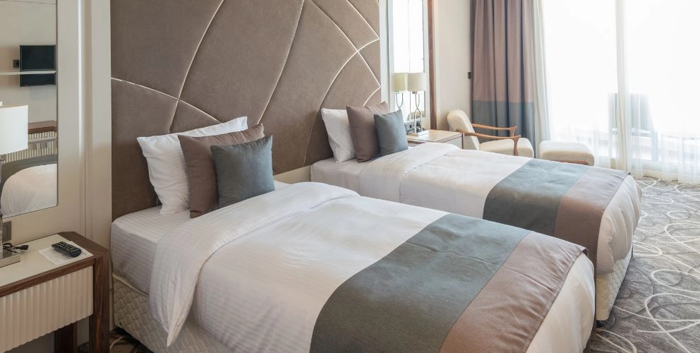 Margenbesteuerung auch bei bloßem Weiterverkauf von Beherbergungsleistungen