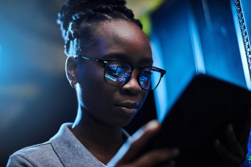 An image of a woman using a digital device