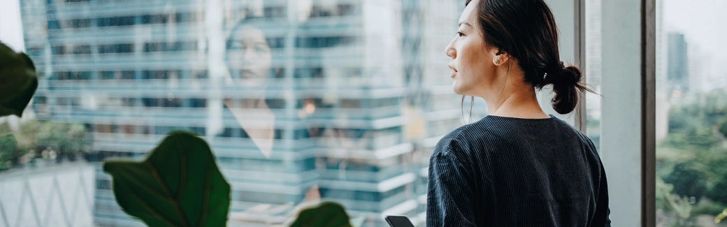 Woman reflection window