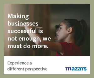 Girls painting a wall ad