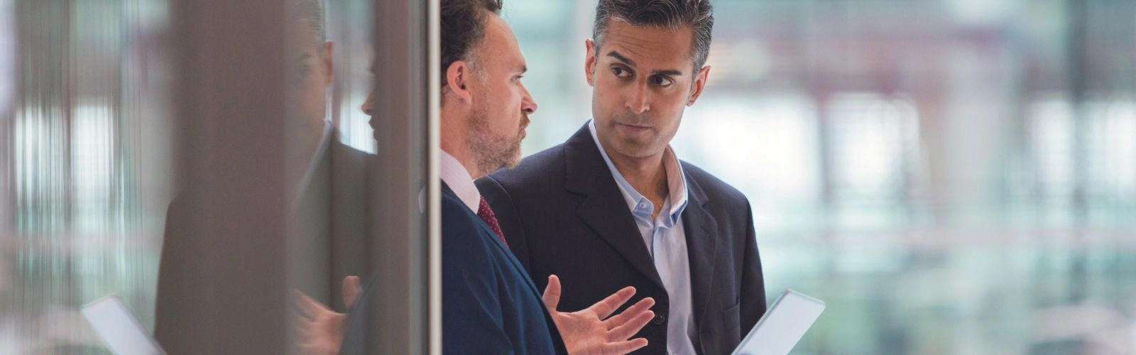 Two business men discussing Sustainability and ESG