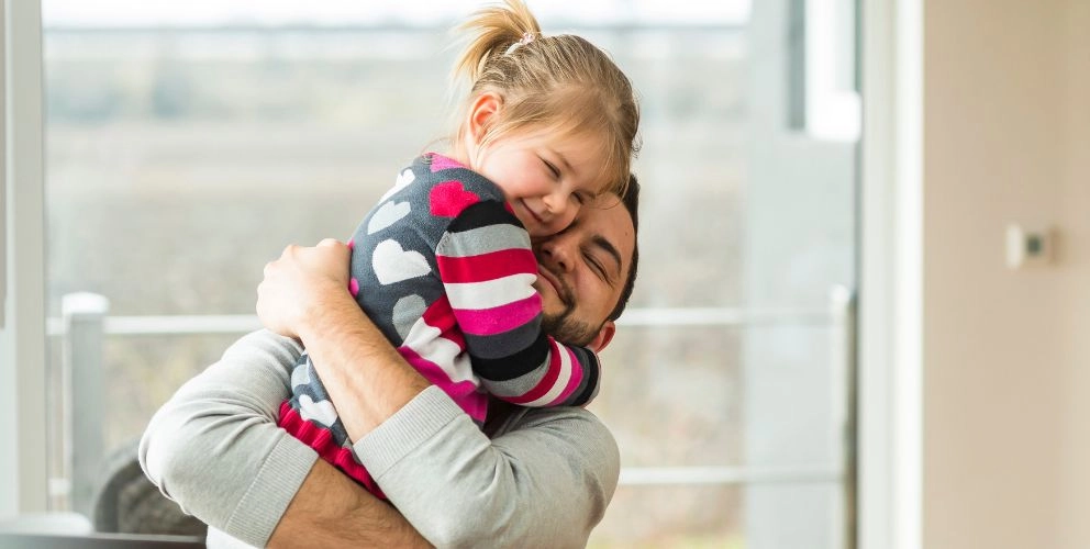 Family embrace symbolising inheritance gifts to family and long-term legacy planning